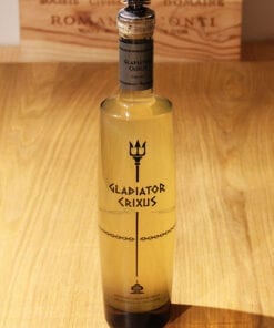 bouteille Liqueur Crixus Gingembre Frais Ferroni sur table en bois