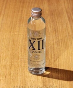 Mignonette Gin XII de Provence 10cl sur table en bois